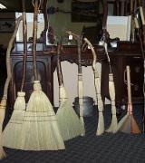 A variety of brooms and walking sticks are available.
