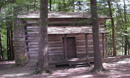 Rustic split log cabin in the Appalachian Mountains.